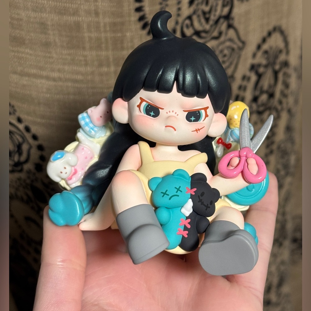 POPMART Dora An Ideal World Series “Doll Play” phone cover